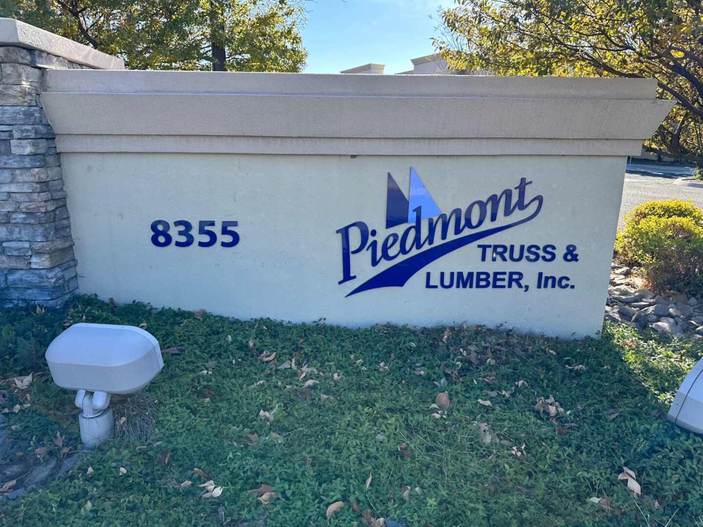 A sign for piedmont truss and lumber
